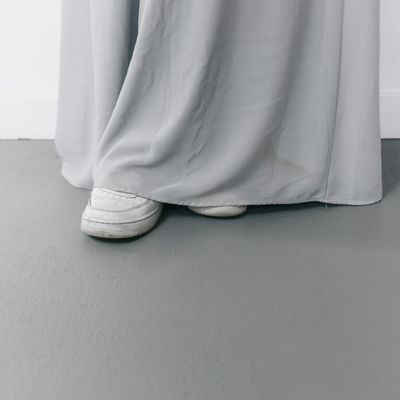 Close-up of comfortable athletic shoes on a clean floor.